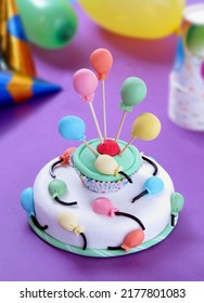 Baby Party Cake On Birthday Party Table Background.