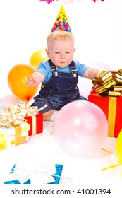 Baby In A Party Hat Happy To Receive A Present