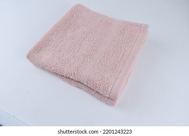 Baby Pink Color Wash Cloth Hand Towel Isolated Top Side View Hand Clean Towel