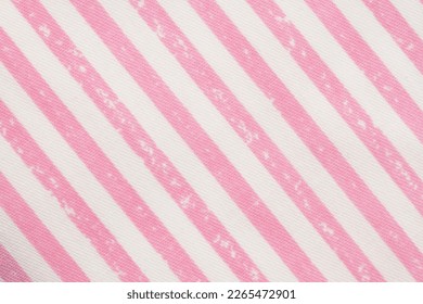 Baby pink striped material textured background with copy space or use as a texture