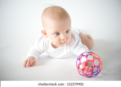 Baby Playing With Ball