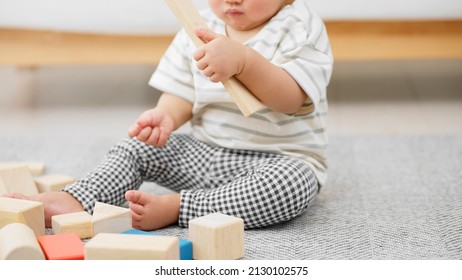 Baby Playing With Building Blocks