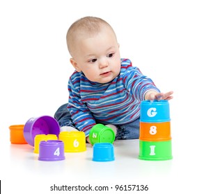 Baby Is Playing With Educational Toys Over White Background