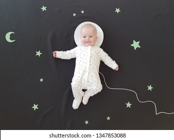 Baby Posing As An Astronaut