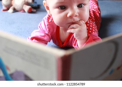 Baby Reading A Book