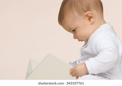 Baby Reading The Book