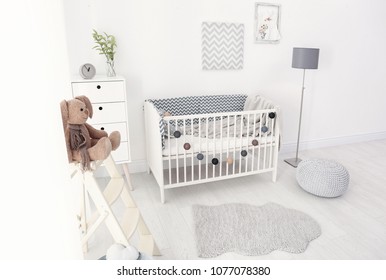 Baby Room Interior With Comfortable Crib