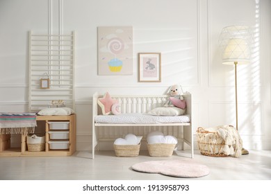 Baby Room Interior With Stylish Furniture And Toys