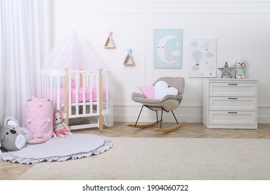 Baby Room Interior With Toys And Stylish Furniture
