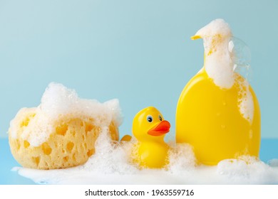 Baby Shampoo  On A White  Background, Rubber Yellow Ducks, Soap Foam. Bathroom Accessories