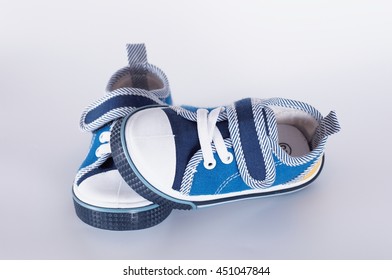 Baby Shoes On A White Background.