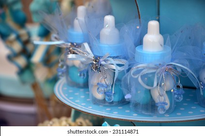 Baby Shower Gift For A Newborn Blue Bottle With Candies During A Party