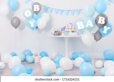 Baby Shower Party For Boy. Tasty Treats In Room Decorated With Balloons