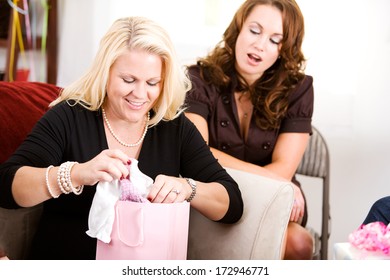 Baby Shower: Woman Opening Gift Bag