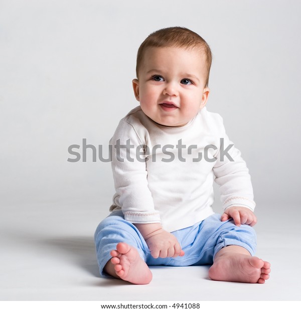 Baby Sits Looking Stock Photo (Edit Now) 4941088