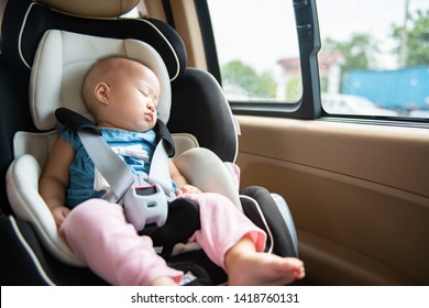 Baby Sleeping In Child Car Seat.