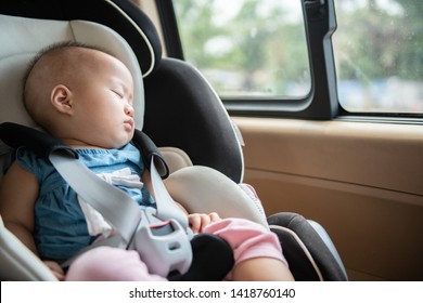 Baby Sleeping In Child Car Seat.