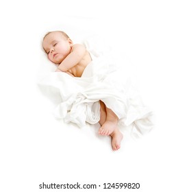 Baby sleeping covered sheet. Isolated on white background.