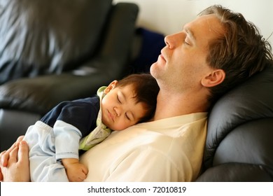 Baby sleeping on dad's chest - Powered by Shutterstock