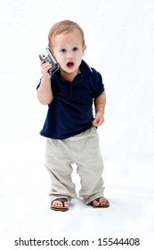 Baby Standing With Phone In Hand Calling And Mouth Open, Isolated