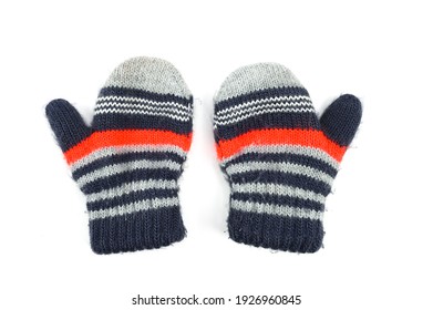 Baby striped mittens, on an isolated white background 