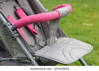 Baby Stroller Close Up,baby Stroller Closeup Gray Color On Grass