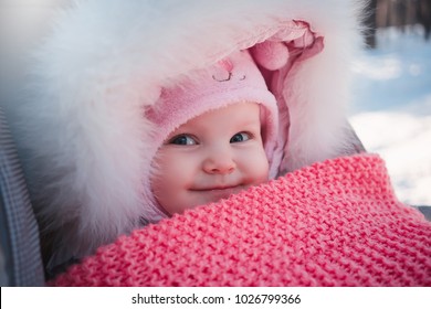 Baby In Stroller At Winter Walk.