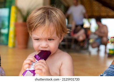 Baby Sucking Grape Popsicle, Narrow Focus