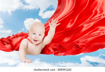 Baby Superhero, Kid Super Hero With Red Superman Cape, Child Boy Flying In Blue Sky