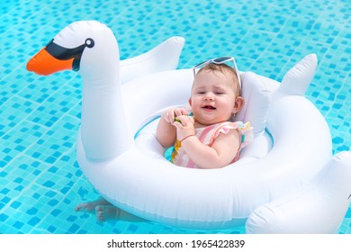 Baby swims in a circle on the sea. Selective focus. Child.