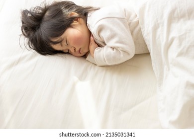 Baby Taking A Nap On A Futon (1 Year 8 Months Old, Japanese, Girl) 