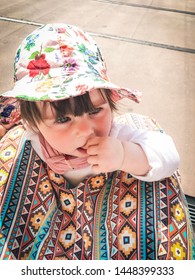 Baby Toddler With Colorful Sunhat In Summer