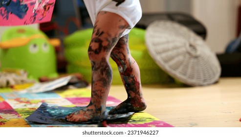 Baby toddler covered in paint, close-up artistic infant legs - Powered by Shutterstock