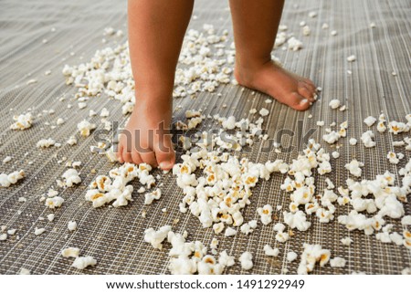 Baby Toes in Spilled Popcorn 