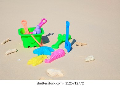 Baby toys on the beach. - Shutterstock ID 1125712772