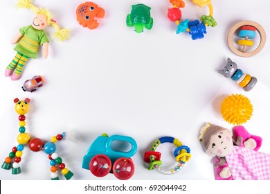 Baby Toys On White With Copy Space. Top View