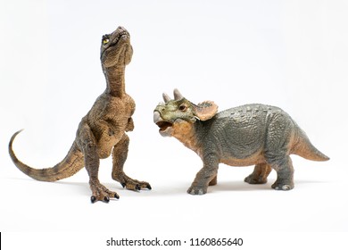 Baby Tyrannosaurus Rex And Baby Triceratops On White Background