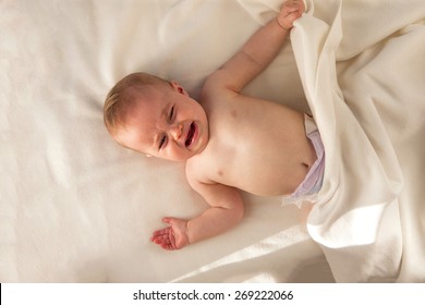 Baby Upset Lying In Her Cot