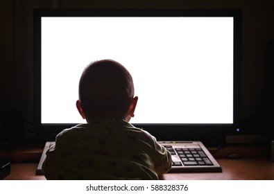 Baby Watching At The Blank Computer Screen (from The Back)