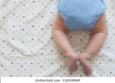 Baby Wearing Blue Cloth Diaper.