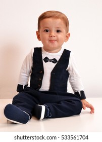 Baby Wearing Tuxedo Suit Portrait.