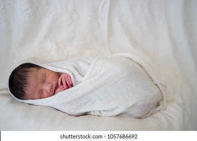 
Baby Wrapped In Sleep