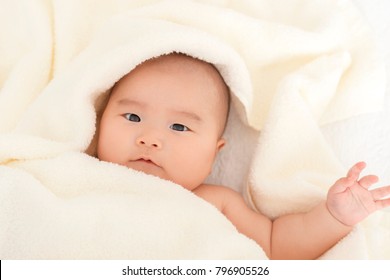 Baby Wrapped In A Towel