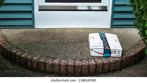 Babylon, New York, USA - 13 September 2018: A Package Is Left On A Front Porch And Is Vulnerable To Being Stolen.