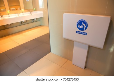 Baby's Diaper Table Changing Cloth Station Install In The Wall At The Airport Restroom,selective Focus