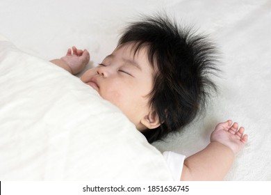 Baby's Face Sleeping On A Futon, 0 Years Old, 4 Months Old, Girl