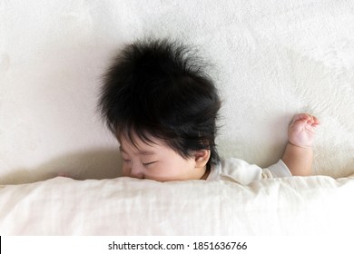 Baby's Face Sleeping On A Futon, 0 Years Old, 4 Months Old, Girl