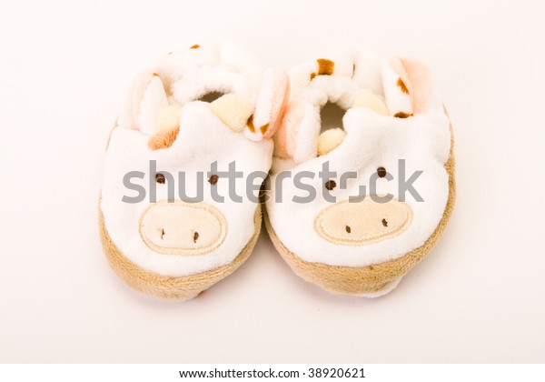 Babys First Booties Against White 