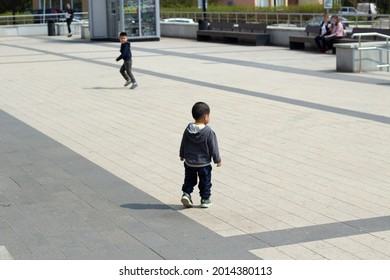 The Baby's In The Square. The Preschooler Got Lost In The City. A Child Shooting From The Back. One Child Walks On The Treadmill. Left Alone.