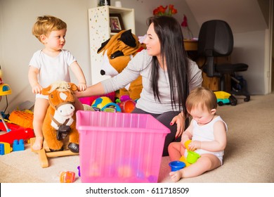 Babysitter Playing With Children